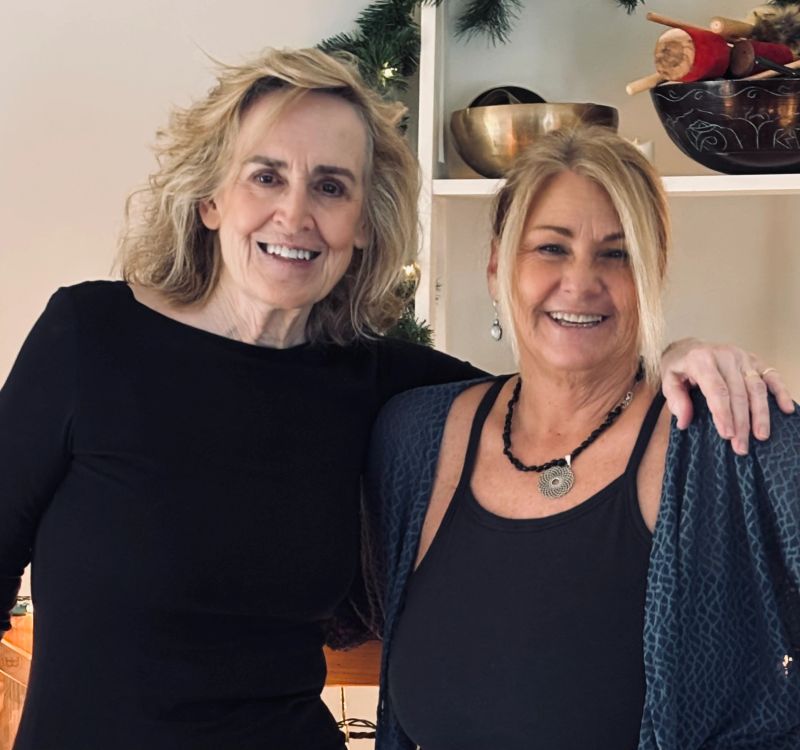Claire with a fellow yogi in December